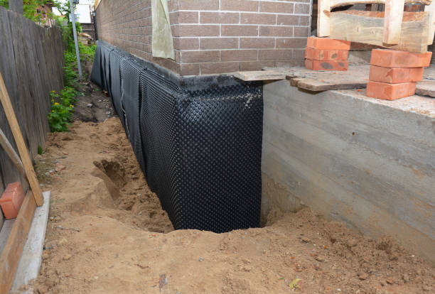 SJ Waterproofing Pros technician performing targeted Foundation Crack Repair assessment in Rossburg, OH